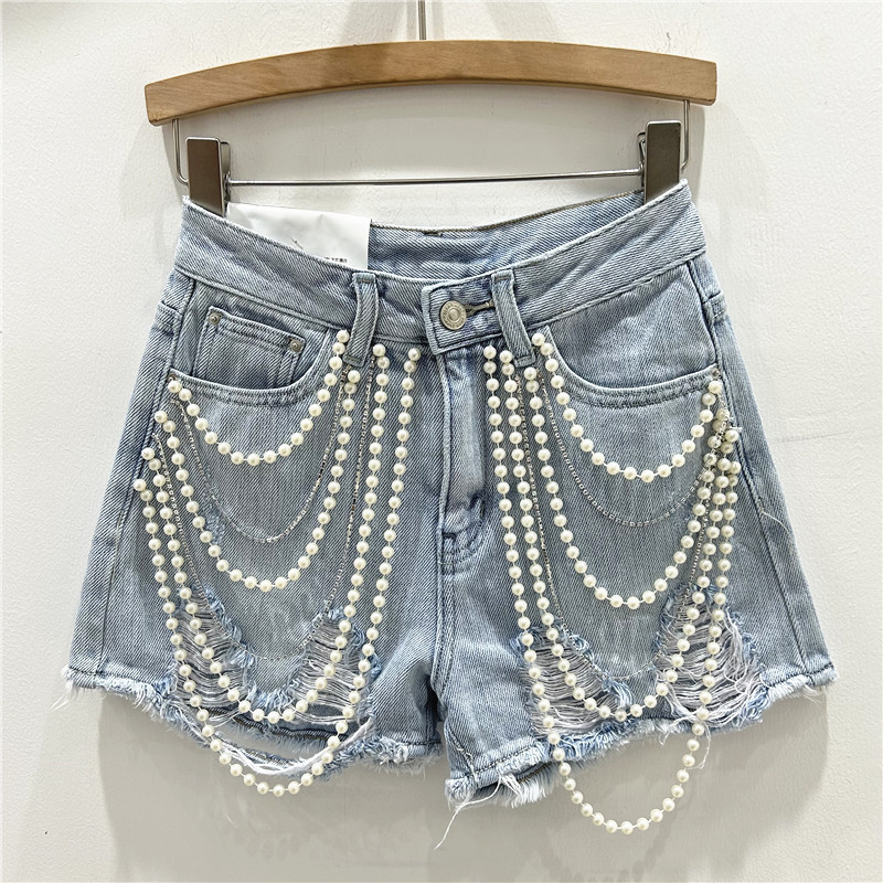 شورت جينز ممزق بفتحات ممزقة من - مراجعة Distressed Jean Rip وسعره