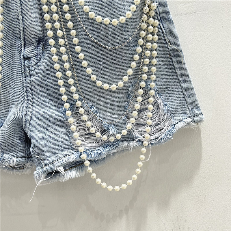 شورت جينز ممزق بفتحات ممزقة من - مراجعة Distressed Jean Rip وسعره
