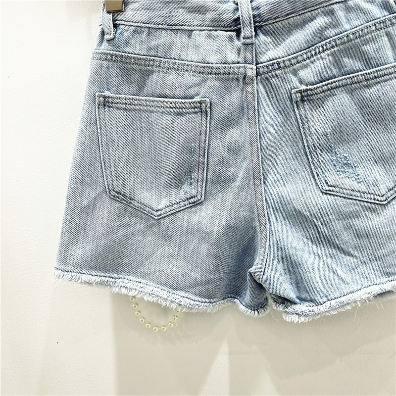 شورت جينز ممزق بفتحات ممزقة من - مراجعة Distressed Jean Rip وسعره