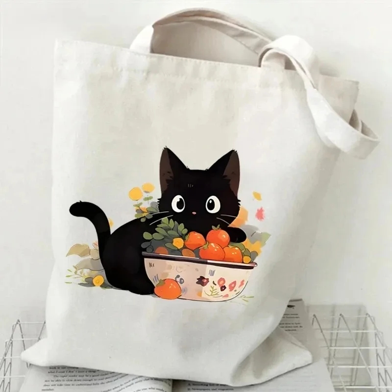 القط والكتاب حقيبة يد قماش الس - مراجعة Tote Bag Canvas Print وسعره
